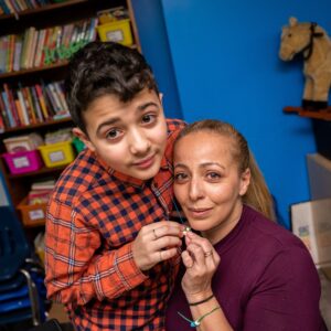 a mother and child pose together at Sojourner House