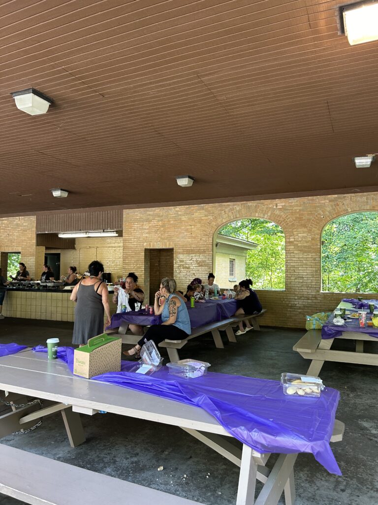 Sojourner House staff and families enjoying fellowship with one another at the Sista to Sista picnic