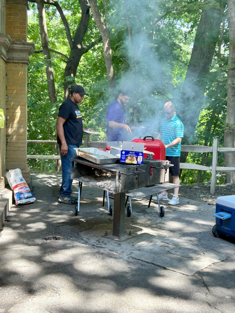 Sojourner House staff grilling for the Sista to Sista picnic